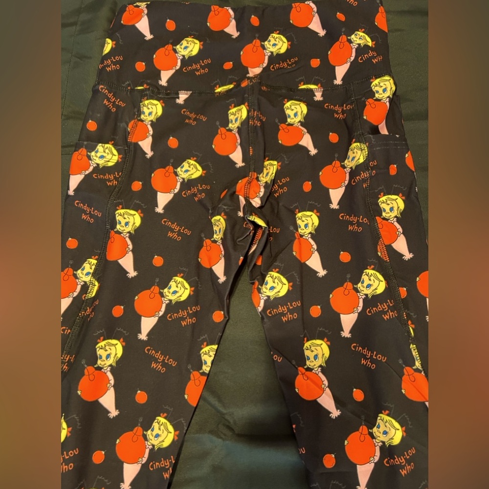 Spread the Holiday Cheer wearing a pair Cindy Lou Who Leggings!